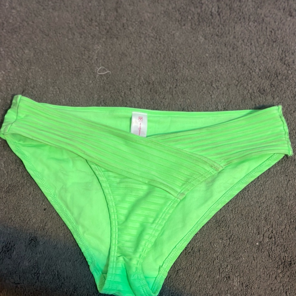 Green swim suit bottom cheeky